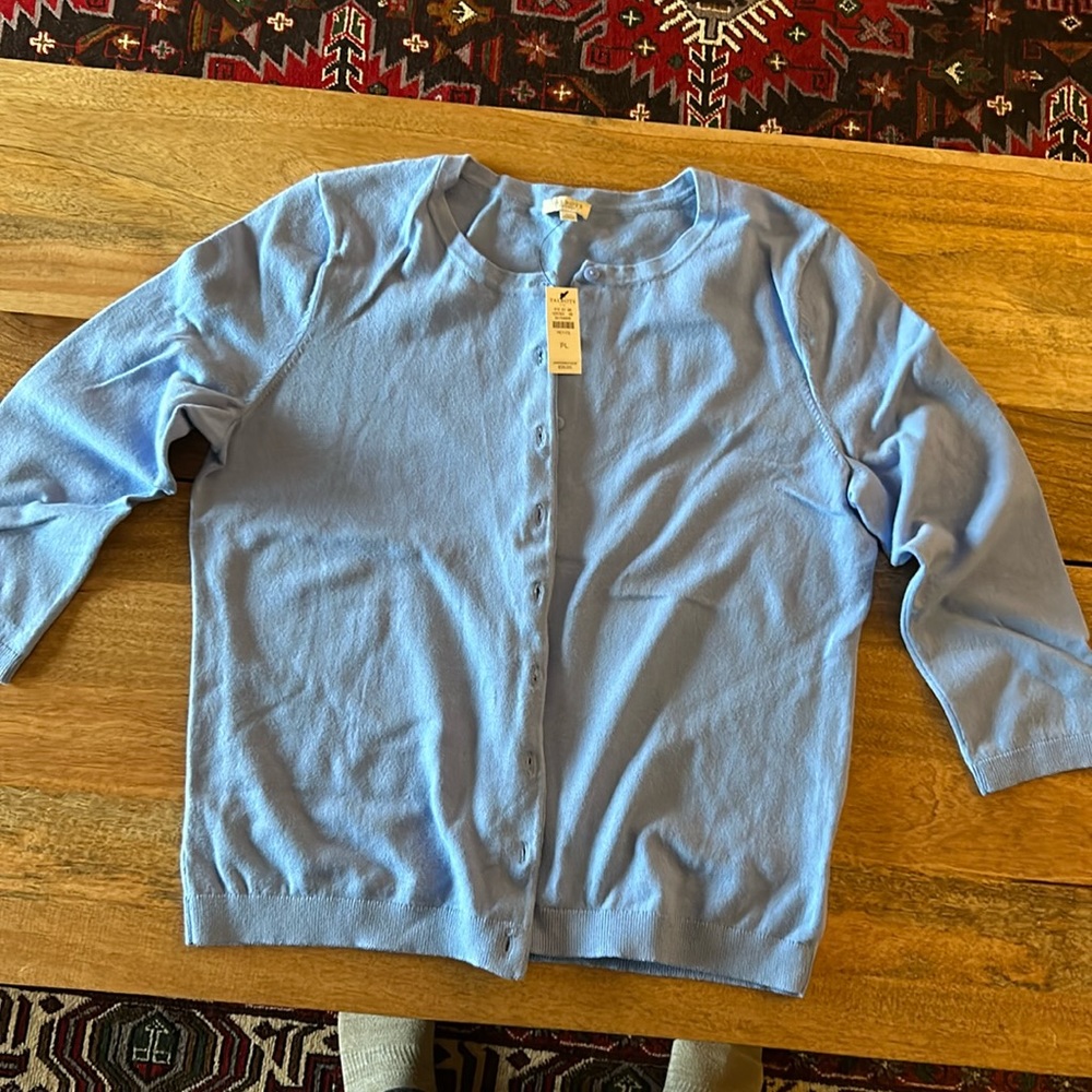 Talbots cardigan with buttons down front three quarter sleeves.